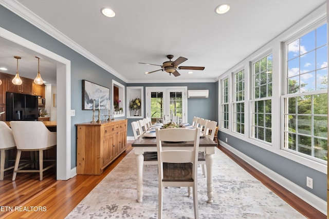 12771 Tanglewood Dr, Knoxville, TN 37922 - dining area with a wall mounted AC, plenty of natural light, wood finished floors, ornamental molding, and a ceiling fan