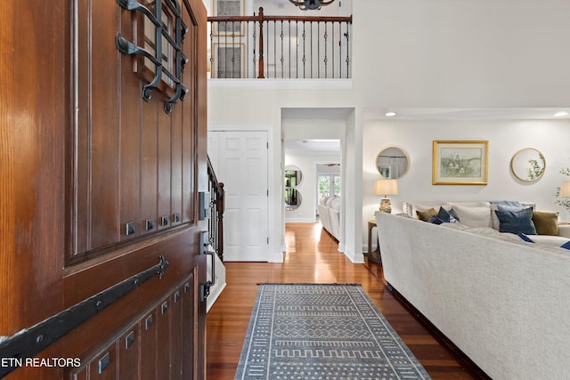 12771 Tanglewood Dr, Knoxville, TN 37922 - foyer entrance with dark wood-style floors, a towering ceiling, and baseboards