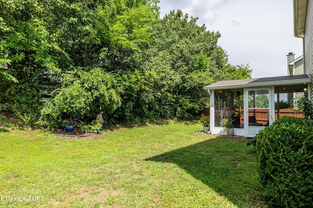 332 Caboose Ln, Maryville, TN 37804 - view of green lawn with a sunroom