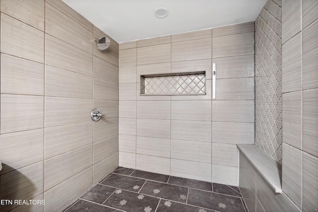8307 Stoney View Ln, Corryton, TN 37721 - bathroom featuring tile walls, tile patterned flooring, and tiled shower