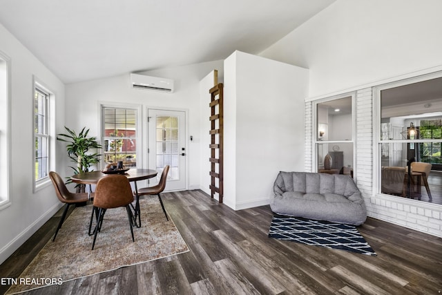 8307 Stoney View Ln, Corryton, TN 37721 - dining room with lofted ceiling, a wall mounted air conditioner, dark wood-style flooring, plenty of natural light, and baseboards
