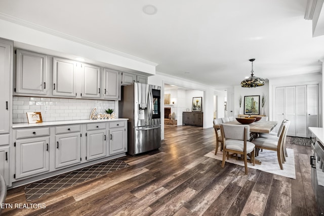 8307 Stoney View Ln, Corryton, TN 37721 - kitchen featuring stainless steel fridge, light countertops, gray cabinetry, and ornamental molding