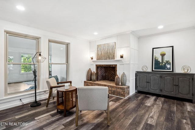 8307 Stoney View Ln, Corryton, TN 37721 - living area featuring dark wood finished floors, recessed lighting, crown molding, and a brick fireplace