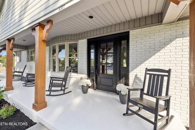 8307 Stoney View Ln, Corryton, TN 37721 - property entrance with brick siding and covered porch