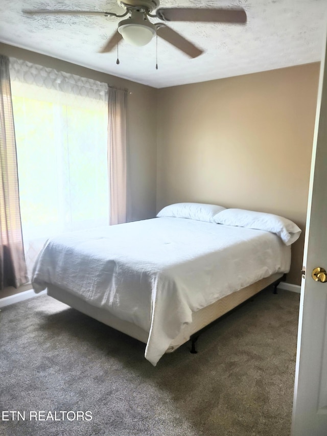 bedroom featuring carpet flooring and ceiling fan