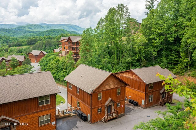 view of subject property featuring mountains
