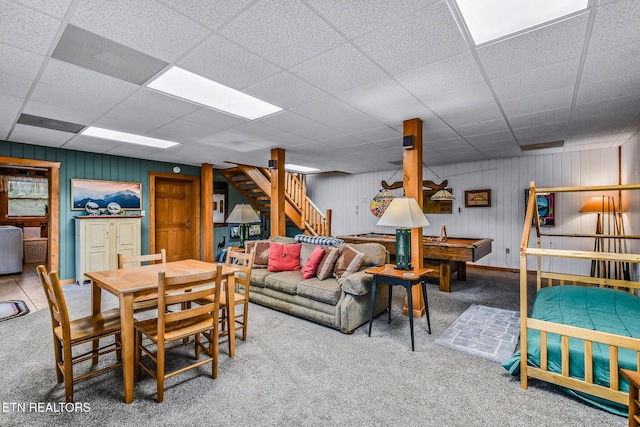 813 Pine Top Ln, Gatlinburg, TN 37738 - carpeted dining room featuring stairs, a paneled ceiling, billiards, and wooden walls