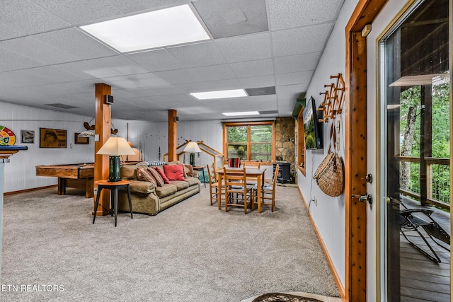813 Pine Top Ln, Gatlinburg, TN 37738 - living room featuring a drop ceiling, baseboards, and carpet floors