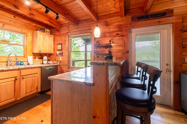 4186 Evans Chapel Rd, Sevierville, TN 37876 - kitchen with a sink, dishwasher, wooden ceiling, light wood-style floors, and wooden walls