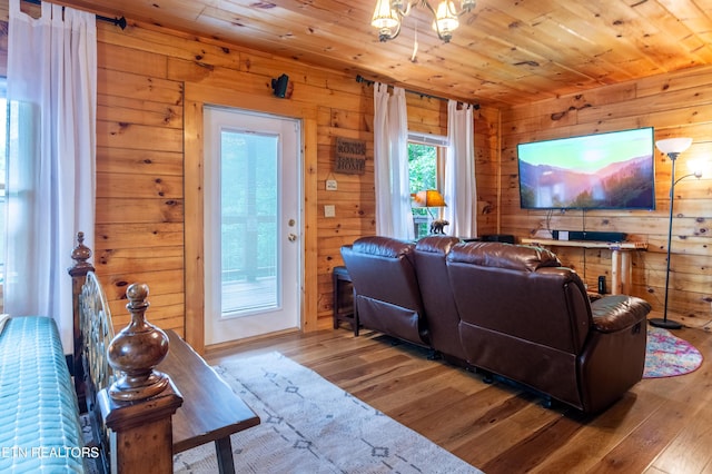 4186 Evans Chapel Rd, Sevierville, TN 37876 - living area with wood finished floors, wood walls, and wood ceiling