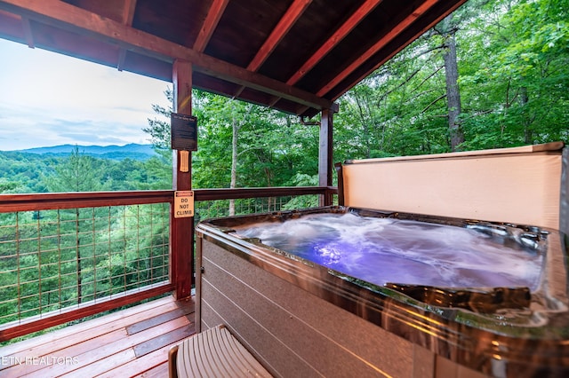 4186 Evans Chapel Rd, Sevierville, TN 37876 - deck featuring a hot tub and a mountain view