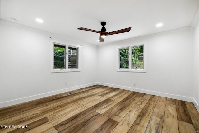 520 S David Ln, Knoxville, TN 37922 - empty room featuring crown molding, a ceiling fan, hardwood / wood-style flooring, baseboards, and recessed lighting