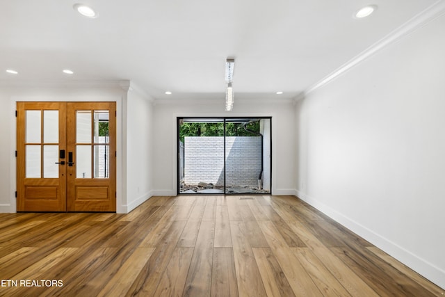 520 S David Ln, Knoxville, TN 37922 - spare room featuring baseboards, crown molding, wood finished floors, recessed lighting, and french doors