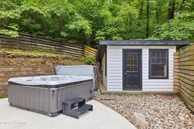 520 S David Ln, Knoxville, TN 37922 - view of outbuilding with a hot tub, fence, and an outbuilding