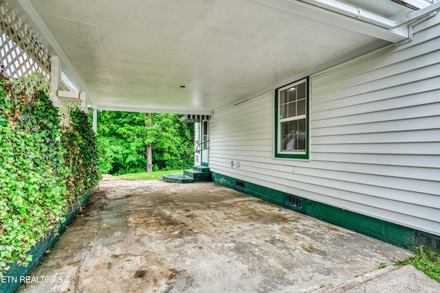 116 Davis Cir, Harriman, TN 37748 - view of patio featuring entry steps and an attached carport
