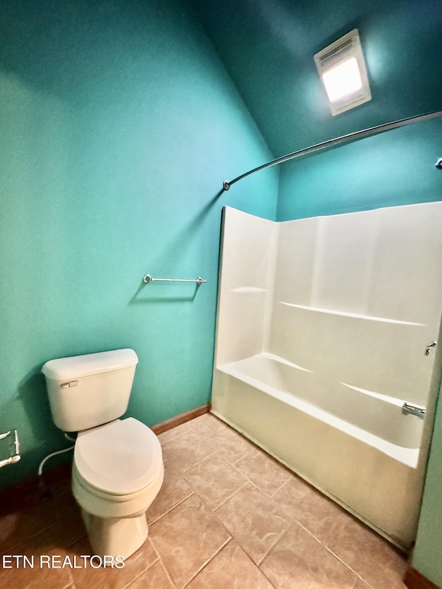 721 Fan St, Tazewell, TN 37879 - bathroom featuring toilet, bathing tub / shower combination, baseboards, and tile patterned flooring