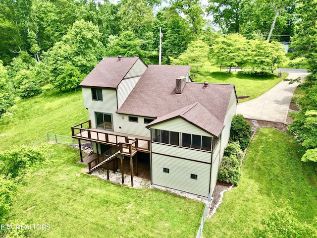 721 Fan St, Tazewell, TN 37879 - back of house featuring a shingled roof, a deck, stairway, a sunroom, and a yard