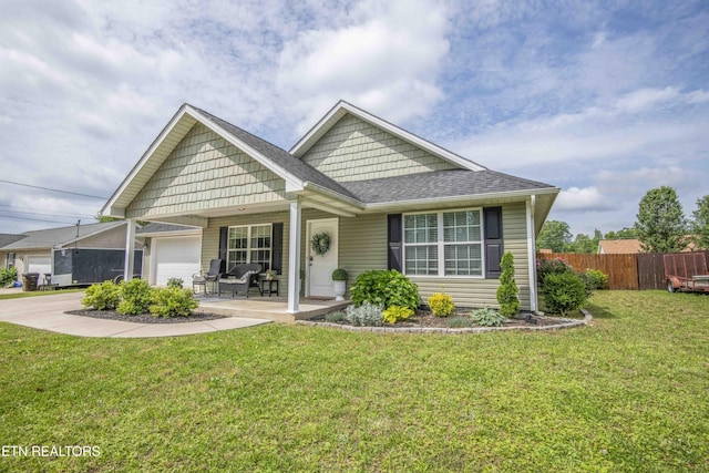 155 Signet Ln, Maynardville, TN 37807 - view of front of home featuring an attached garage, covered porch, driveway, and roof with shingles