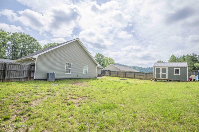 155 Signet Ln, Maynardville, TN 37807 - view of yard featuring a storage shed, an outdoor structure, and central AC