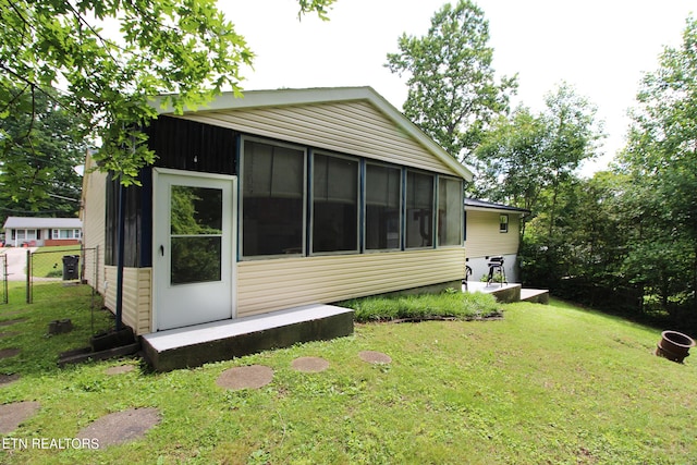 4708 Springbrook Rd, Knoxville, TN 37921 - view of home's exterior featuring a sunroom