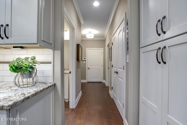 123 Seminole Ln, Loudon, TN 37774 - corridor with crown molding, dark wood-style floors, and baseboards