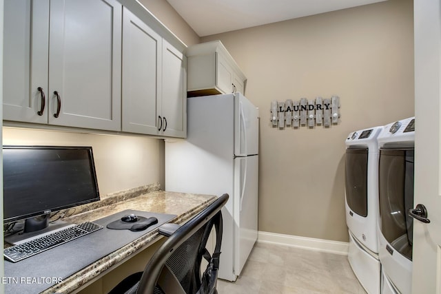 123 Seminole Ln, Loudon, TN 37774 - washroom with baseboards, a desk, and washing machine and clothes dryer