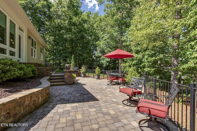 123 Seminole Ln, Loudon, TN 37774 - view of patio featuring outdoor dining area