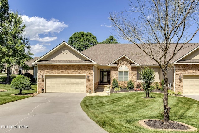 162 Tanasi Lagoon Dr, Loudon, TN 37774 - ranch-style home featuring concrete driveway, a front lawn, an attached garage, and roof with shingles