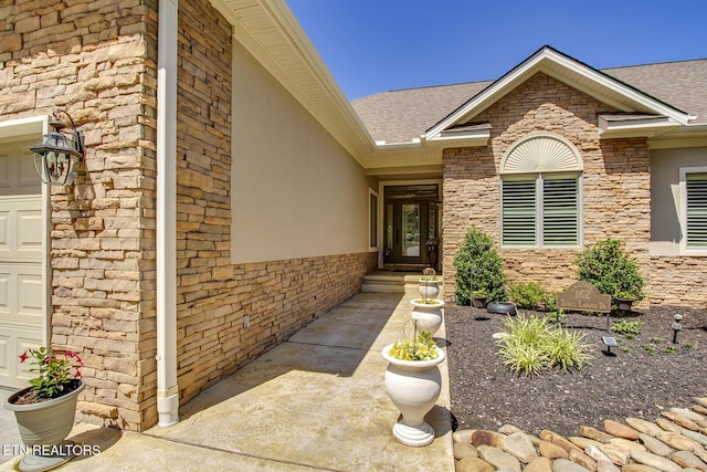 162 Tanasi Lagoon Dr, Loudon, TN 37774 - doorway to property featuring a shingled roof and a garage