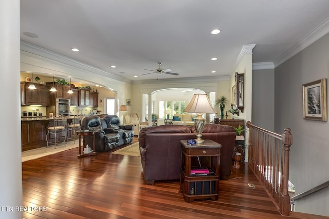 162 Tanasi Lagoon Dr, Loudon, TN 37774 - living room featuring arched walkways, ornamental molding, a ceiling fan, dark wood-style flooring, and recessed lighting