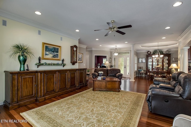 162 Tanasi Lagoon Dr, Loudon, TN 37774 - living room with ceiling fan, ornate columns, dark wood-style floors, a chandelier, and ornamental molding