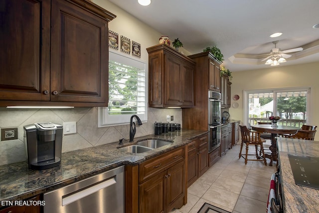162 Tanasi Lagoon Dr, Loudon, TN 37774 - kitchen with stainless steel appliances, a sink, backsplash, recessed lighting, and ceiling fan