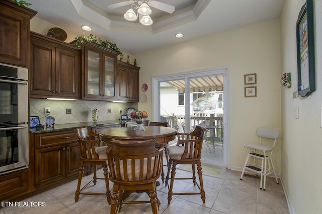 162 Tanasi Lagoon Dr, Loudon, TN 37774 - dining area with a ceiling fan, crown molding, recessed lighting, a tray ceiling, and light tile patterned floors