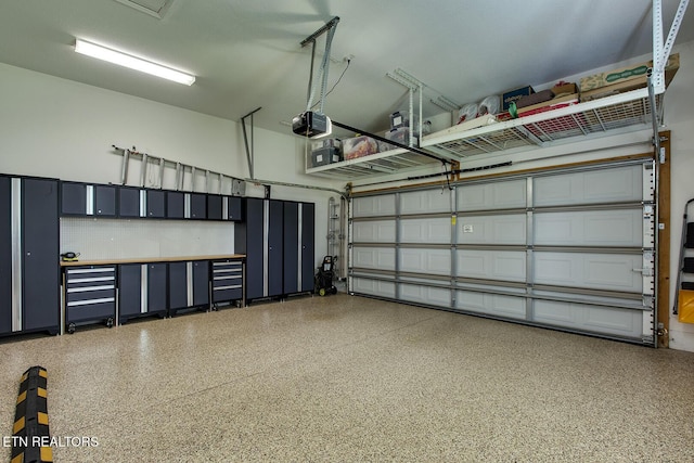 162 Tanasi Lagoon Dr, Loudon, TN 37774 - garage with a garage door opener