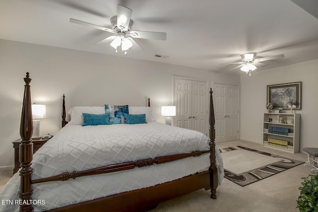 162 Tanasi Lagoon Dr, Loudon, TN 37774 - bedroom featuring carpet flooring, two closets, and ceiling fan