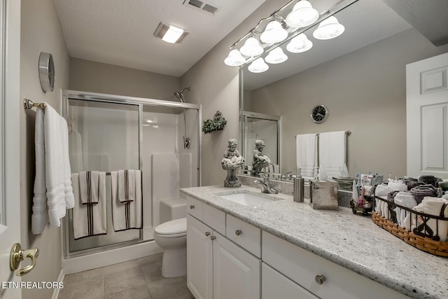 162 Tanasi Lagoon Dr, Loudon, TN 37774 - bathroom featuring vanity, a shower stall, toilet, and tile patterned flooring