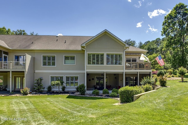 162 Tanasi Lagoon Dr, Loudon, TN 37774 - back of house with a yard and stucco siding
