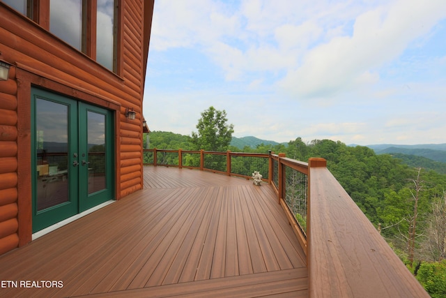 2266 Lone Ridge Dr, Sevierville, TN 37862 - deck featuring french doors, a mountain view, and a forest view