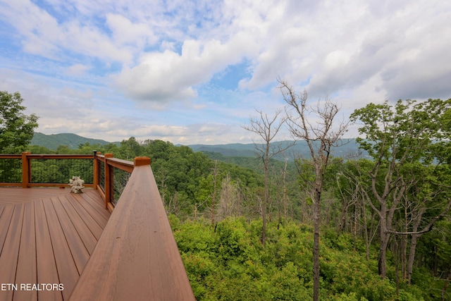 2266 Lone Ridge Dr, Sevierville, TN 37862 - wooden terrace with a mountain view and a wooded view
