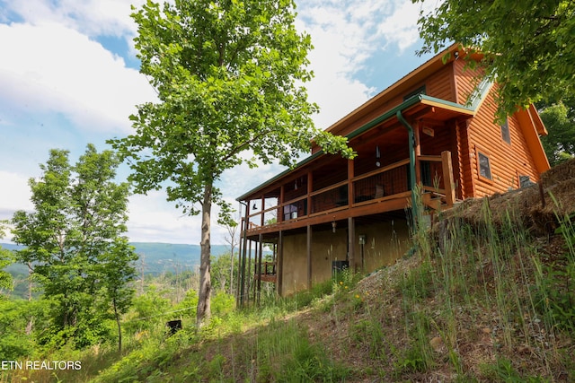 2266 Lone Ridge Dr, Sevierville, TN 37862 - rear view of property featuring a wooden deck