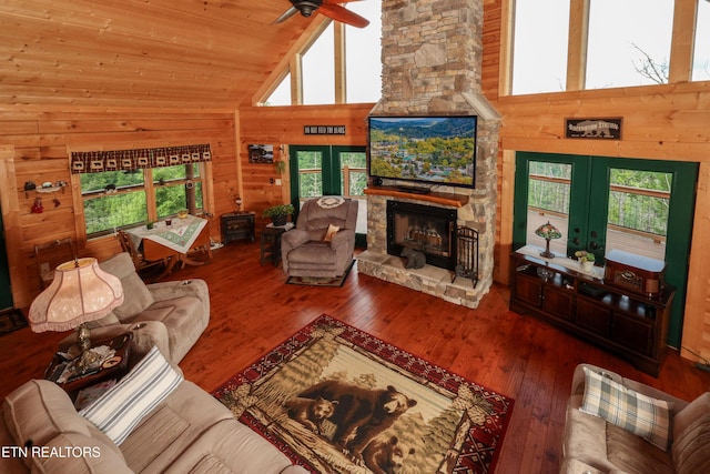 2266 Lone Ridge Dr, Sevierville, TN 37862 - living area with plenty of natural light, ceiling fan, french doors, high vaulted ceiling, and hardwood / wood-style floors