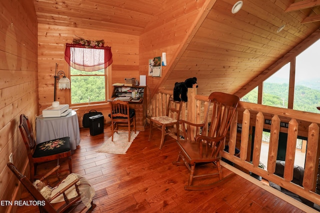 2266 Lone Ridge Dr, Sevierville, TN 37862 - sitting room with healthy amount of natural light, vaulted ceiling, wooden ceiling, wood walls, and hardwood / wood-style flooring