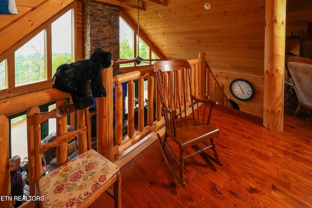 2266 Lone Ridge Dr, Sevierville, TN 37862 - staircase featuring lofted ceiling, hardwood / wood-style floors, wooden walls, and wooden ceiling