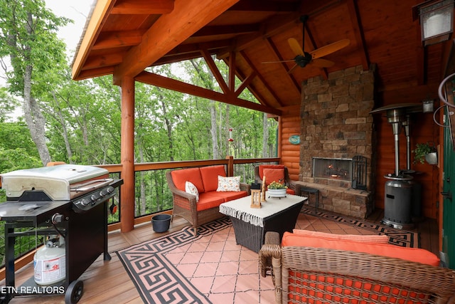 2266 Lone Ridge Dr, Sevierville, TN 37862 - view of patio / terrace featuring ceiling fan, an outdoor living space with a fireplace, a wooden deck, and grilling area
