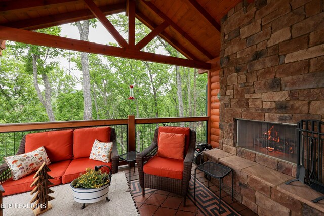 2266 Lone Ridge Dr, Sevierville, TN 37862 - view of patio / terrace with an outdoor living space with a fireplace