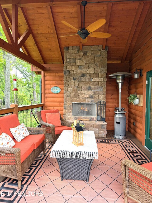 2266 Lone Ridge Dr, Sevierville, TN 37862 - view of patio with a ceiling fan and an outdoor living space with a fireplace