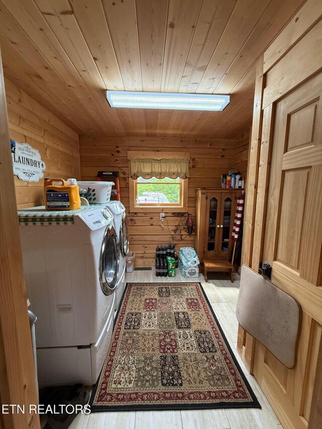 2266 Lone Ridge Dr, Sevierville, TN 37862 - washroom featuring wooden walls, wood ceiling, independent washer and dryer, and wood finished floors