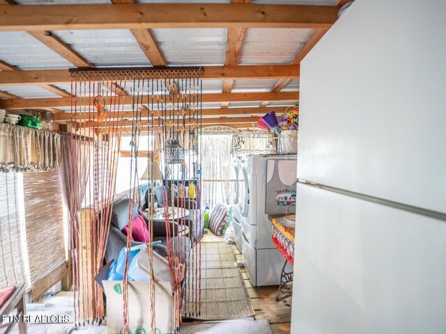 storage area featuring washer and dryer