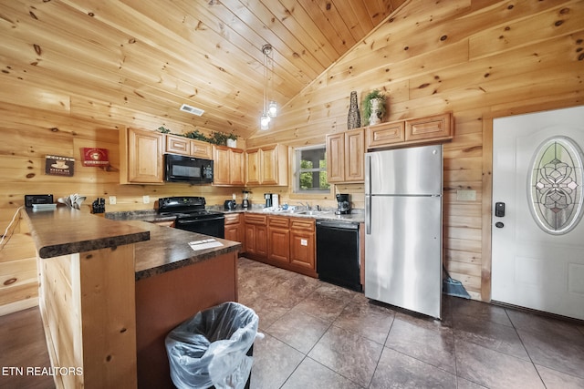 kitchen featuring black appliances, wood ceiling, wooden walls, dark countertops, and a peninsula