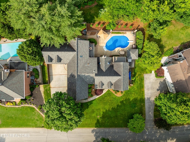 drone / aerial view of a pool area
